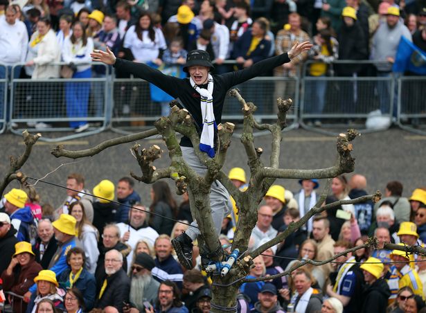 Leeds United fans celebrate the Championship Celebration Parade on The Headrow on May 05, 2025 in Leeds, England. 