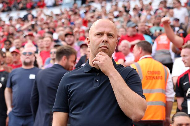 Arne Slot, Manger of Liverpool, looks on prior to the Premier League match between Liverpool FC and Arsenal FC at Anfield