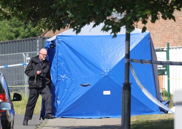 Police at the scene of a murder on Thrush Drive, Bury. 
CSI officer at the scene.
Picture Jason Roberts / Manchester Evening News