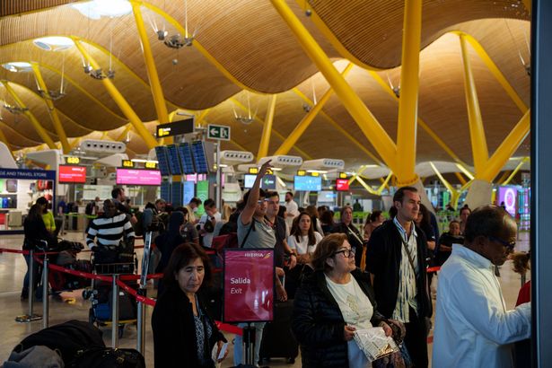 MADRID, SPAIN - APRIL 29: Several people who spent the night at the T4 terminal of the Adolfo Suarez-Madrid Barajas airport after canceling their flight due to the power outage, on 29 April, 2025 in Madrid, Spain. Spain is gradually returning to normal after yesterday's 12:30 a.m. power outage, which also hit Portugal and part of France. One day later, classes in schools in the Community of Madrid have been suspended and rail traffic has returned to the country with 99.9% of the electricity supply. Train stations such as Atocha and Chamartin have remained open all night for passengers who have not been able to return to their destinations. (Photo By Matias Chiofalo/Europa Press via Getty Images)