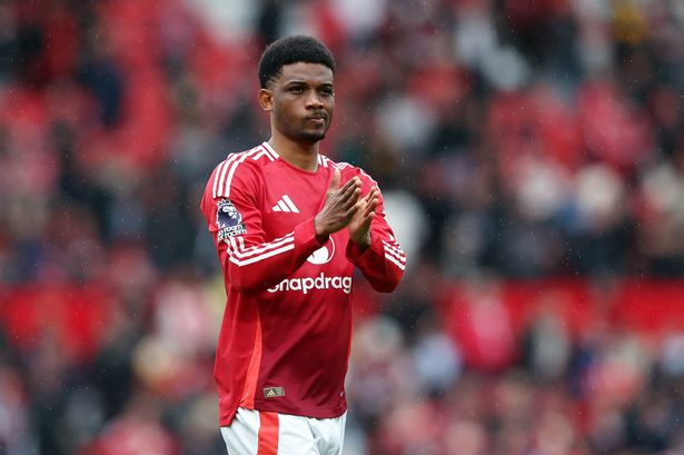 Amad of Manchester United acknowledges the crowd at Old Trafford 