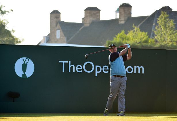 Wide shot of Sandy Lyle swinging a golf club