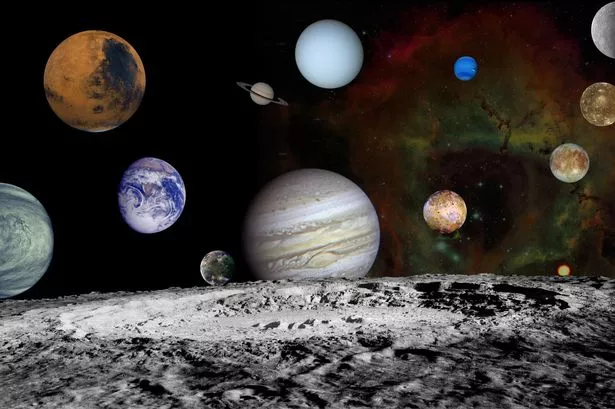 This solar system montage of the nine planets and four large moons of Jupiter in our solar system are set against a false-color view of the Rosette Nebula.