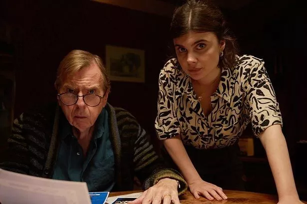 Timothy Spall as John Chapel and Gwyneth Keyworth as Janie Mallowan