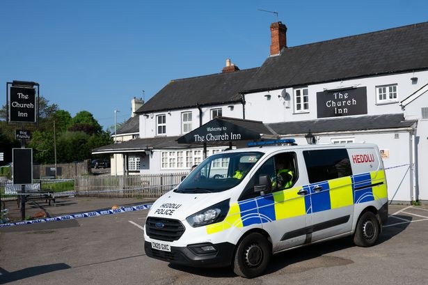 A general view of Church Inn pub with police outside