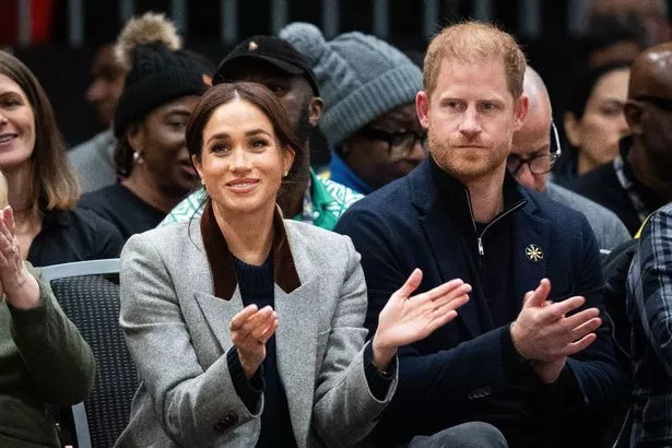 Harry and Meghan watching the Invictus Games