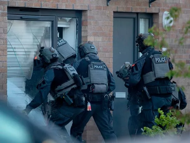 Homes in Glasgow were raided this morning by gang war cops