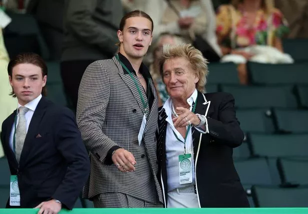 Rod Stewart and his son Alastair Wallace Stewart look on from the stands during the William Hill Premiership match between Celtic FC and St Mirren FC at Celtic Park.