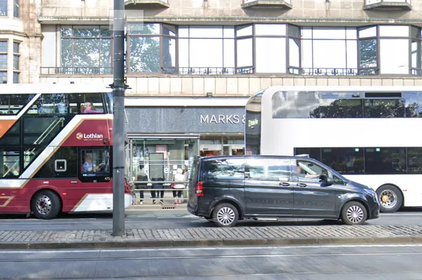 A bus stop outside Marks & Spencer in Princes Street, Edinburgh.