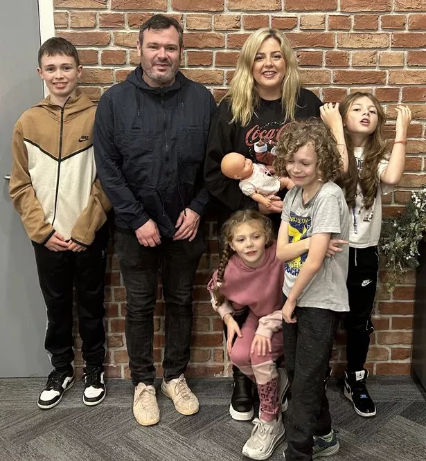 Sophie with her family