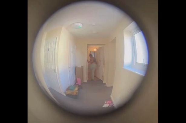 A still image from a doorbell camera video that formed the evidence in a prosecution of a dog owner for mistreating their pet. Lauren Leigh Barker was convicted of two counts of mistreating a dog called Rocco, after video of kicking, shouting and dragging Rocco outside her flat in Portishead was shared with the RSPCA