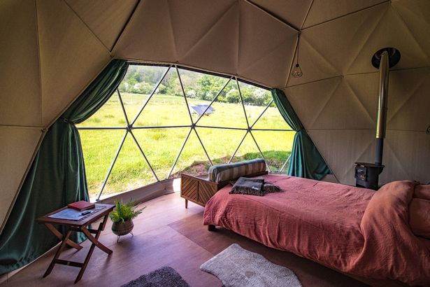 There are also many thoughtful touches like a log fire, books, and blankies that give the space a homely, cwtchy feel,