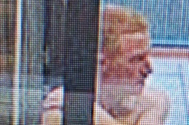 A CCTV image of Thomas who has ginger hair and is pictured without a top in and is said to be wearing wearing black trousers and white trainers