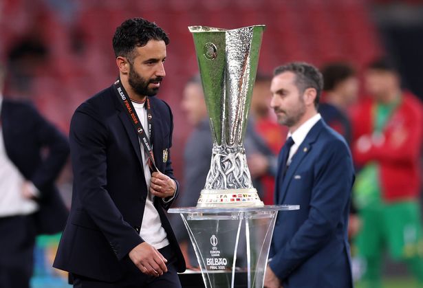 BILBAO, SPAIN - MAY 21: Ruben Amorim, Manager of Manchester United, walks past the UEFA Europa League Trophy after his sides defeat in the UEFA Europa League Final 2025 between Tottenham Hotspur and Manchester United at Estadio de San Mames on May 21, 2025 in Bilbao, Spain. (Photo by Michael Steele/Getty Images)