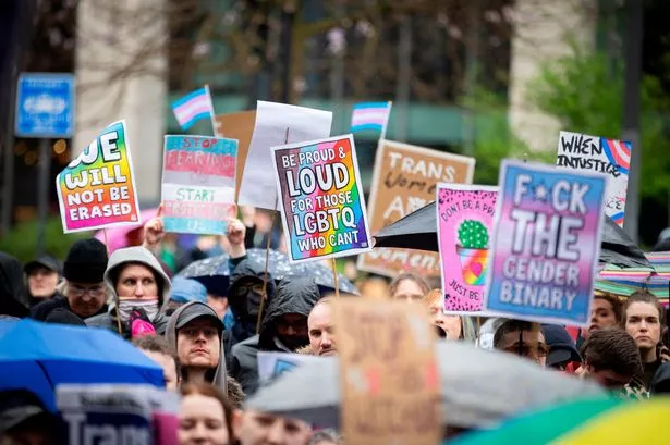 Trans rights campaigners gather in St Peter's Square in Manchester