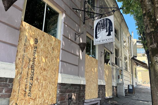 The Woods at the top of Park Street is closed, with windows boarded up on Wednesday, April 30
