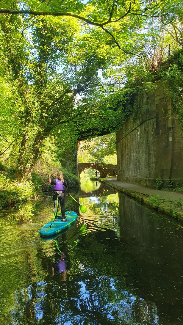 As sunlight filtered through the canopy of trees, I glided along the still waters
