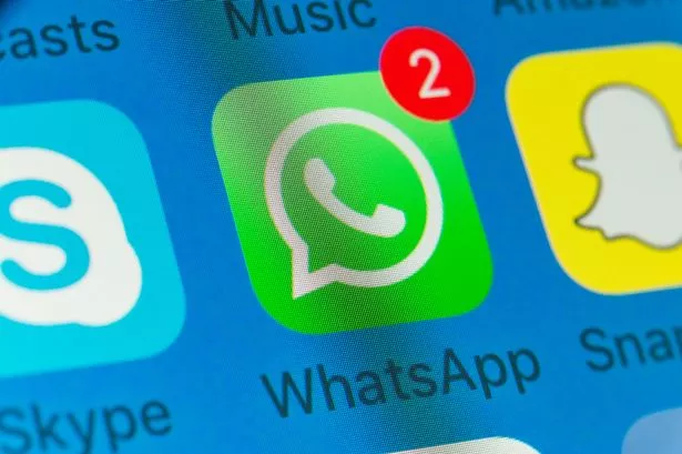 London, UK - August 01, 2018: The buttons of WhatsApp, Snapchat, Skype Music and Messages on the screen of an iPhone.