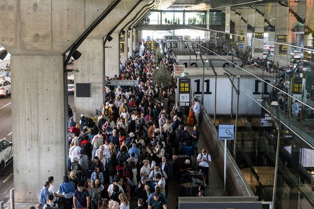 MADRID, SPAIN - APRIL 28: People queue for a taxi at Barajas Airport on April 28, 2025 in Madrid, Spain. There was a widespread power outage today in Spain and Portugal and parts of France. (Photo by Pablo Blazquez Dominguez/Getty Images)