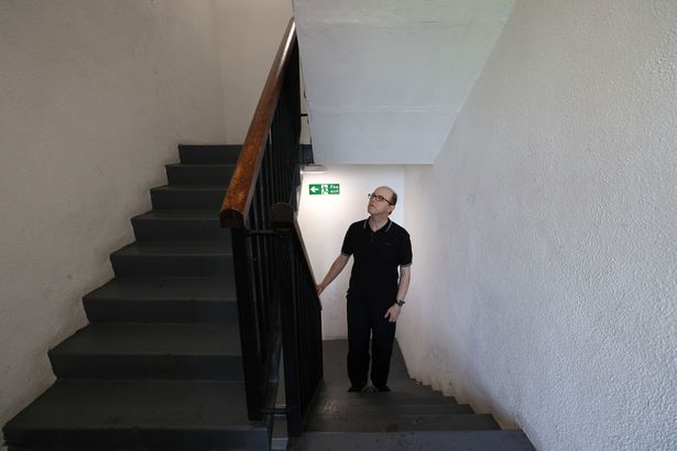 Willow Rise resident Christopher Penfold Ivany has to struggle up the stairs because of the broken lifts