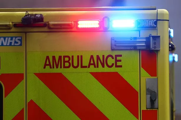 Emergency flashing lights are seen on an ambulance
