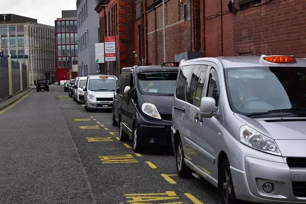 Wirral taxi drivers lined up near ASDA in Birkenhead