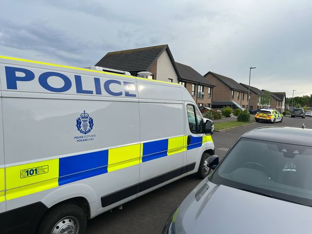 Police at the scene on Sunday evening
