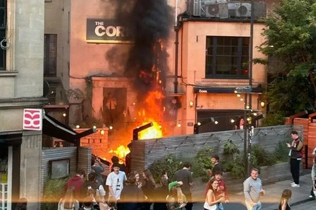 An umbrella caught fire in a pub garden