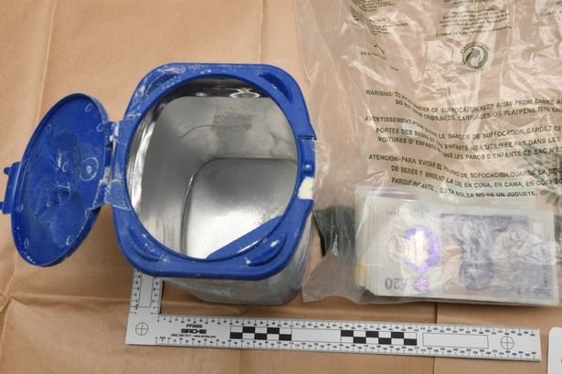 The WhatsApp terror group was discovered after Omar Hussain Ahmadi was arrested at Stansted Airport and found with £7,000 hidden in baby milk powder tins leading to his mobile phone being seized - with the tin and cash pictured