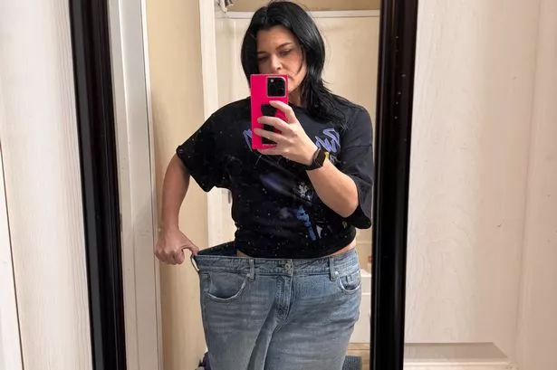 Person wearing jeans too big for them