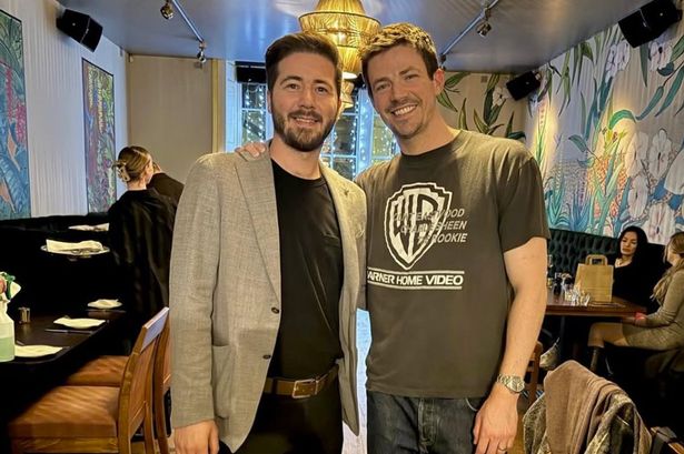 Actor Grant Gustin, right, at Kassap Meat House, Bold Street