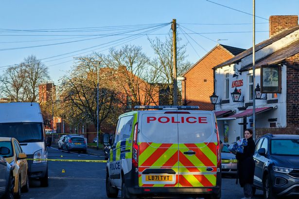 Police at the scene of a stabbing on Wrigley Head, Failsworth.