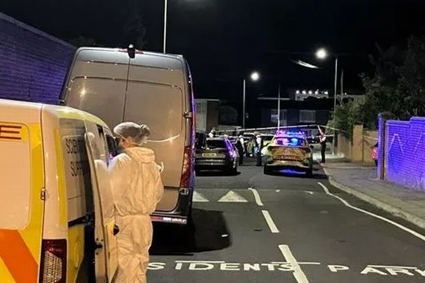 Police and forensics officers in Phythian Close, Kensington