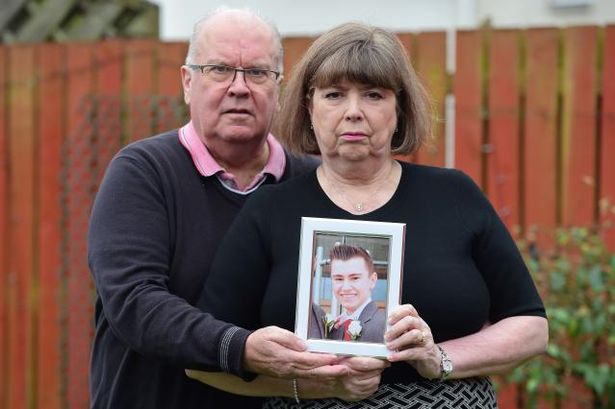 Ann and Gerry Starks with a picture of their son Richard