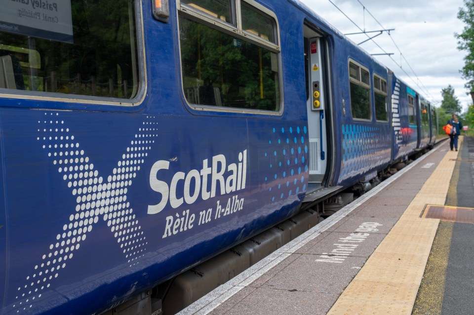 Scotrail train at a station platform.