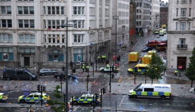 Car collides with pedestrians at parade celebrating soccer win in Liverpool, England