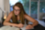 Young girl studying for exams