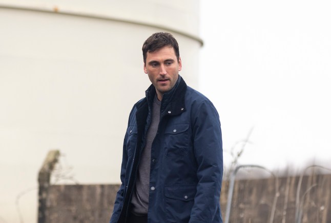 Kit Green looks troubled in Coronation Street
