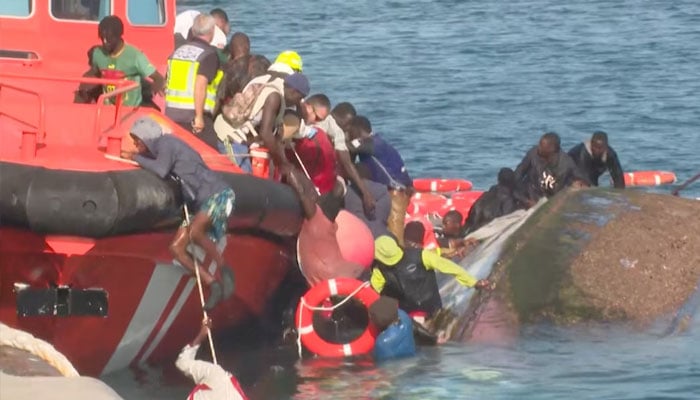 A view shows emergency services trying to rescue migrants from the water, as a migrant boat capsized as rescuers were escorting it to port in Spains Canary Islands, in La Restinga, Spain May 28, 2025, in this screengrab obtained from a video. —Reuters