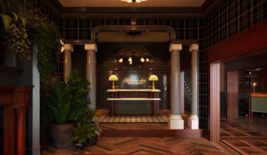 portrush adelphi northern ireland heritage maritime landscape golfing green tartan wallpaper lobby reception desk chevron wood flooring indoor plants