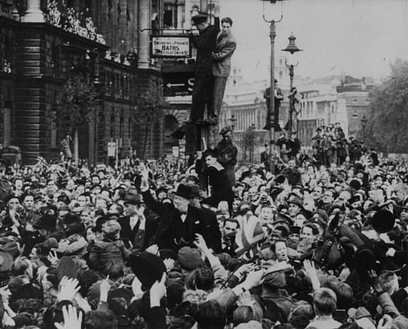 WWII: Peace: Victory in Europe: Britain VE Day: Picture shows: Prime Minister Winston Churchill is mobbed after his VE Day broadcast. Then he told the crowd: 'It is your Victory'.(for original caption see version)WWIIpiclibscans