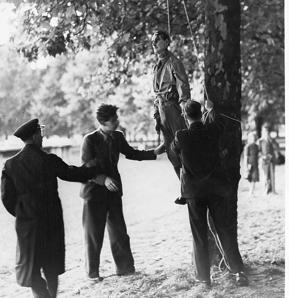 Today was  Der Tag  day but Hitler only arrived at Buckingham Palace in the form of an effigy, which was hung on a tree in the Green Park.  The original caption to these photographs refers to the fact that 15 August 1940 was one of the dates speculated as being the day the Germans would invade Britain. However, the victory of the RAF over the Luftwaffe in the Battle of Britain meant that Germany could not offer cover for landing troops and the invasion was cancelled.. REXMAILPIX.