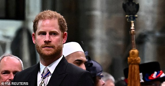 FILE PHOTO: Britain's Prince Harry, Duke of Sussex looks on as Britain's King Charles III leaves Westminster Abbey after the Coronation Ceremonies in central London on May 6, 2023. -     BEN STANSALL/Pool via REUTERS/File Photo