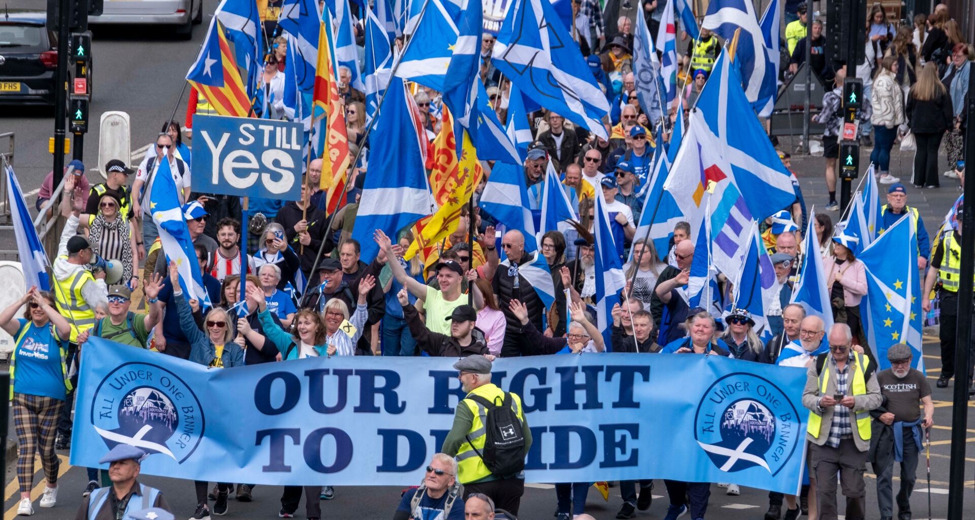Scottish independence activists march through Glasgow as key figures snub event