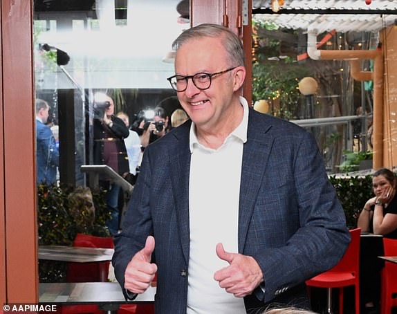 Australian Prime Minister Anthony Albanese and partner Jodie Haydon speak to patrons as they attend Bar Italia in Leichhardt, Sydney, Sunday, May 4, 2025. (AAP Image/Lukas Coch) NO ARCHIVING