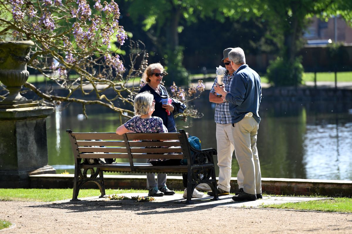 Kevin and Shelley Dunbar were caught enjoying the sun.