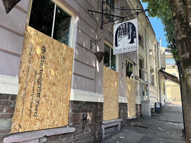 The Woods at the top of Park Street is closed, with windows boarded up on Wednesday, April 30