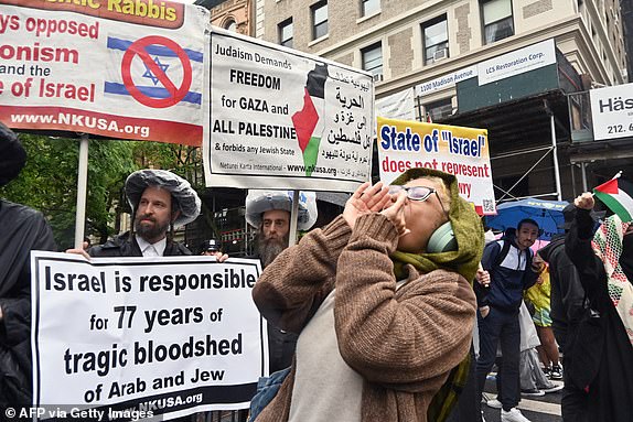 A small crowd of pro-Palestinian protesters gather outside the Met before the 2025 Met Gala at the Metropolitan Museum of Art on May 5, 2025, in New York. The Gala raises money for the Metropolitan Museum of Art's Costume Institute. The 2025 Met Gala is themed "Tailored for You," aligning with the Costume Institute's exhibition, "Superfine: Tailoring Black Style," set to open to the public on May 10. (Photo by Andrea RENAULT / AFP) (Photo by ANDREA RENAULT/AFP via Getty Images)