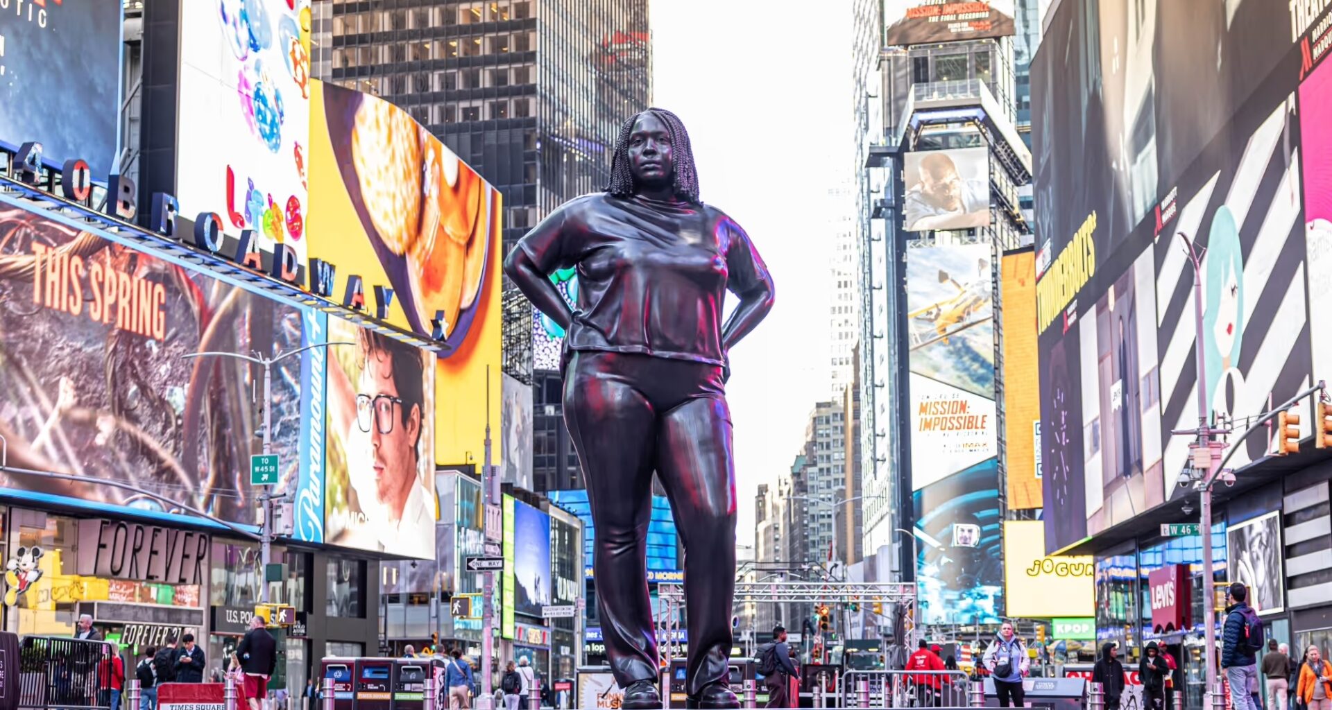 There's a massive bronze sculpture of a woman in the middle of Times Square in NYC right now