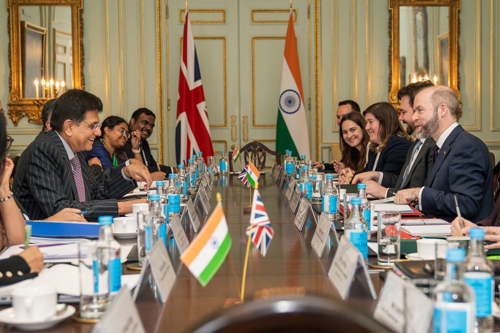 \u200bBusiness and Trade Secretary, Jonathan Reynolds with Indian Minister of Commerce and Industry, Piyush Goyal with others